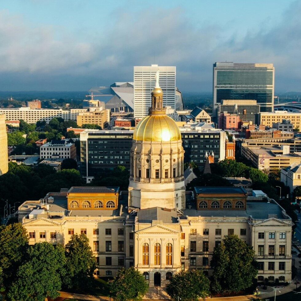 GA capitol cropped square An aerial view of the Georgia state capitol building zoomed in on the gold dome of the building